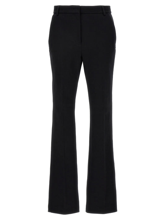 Casual Pants by Sportmax for women in cotton black presents a tailored silhouette, showcasing a tailored and long cut with a refined for a truly tailored aesthetic.