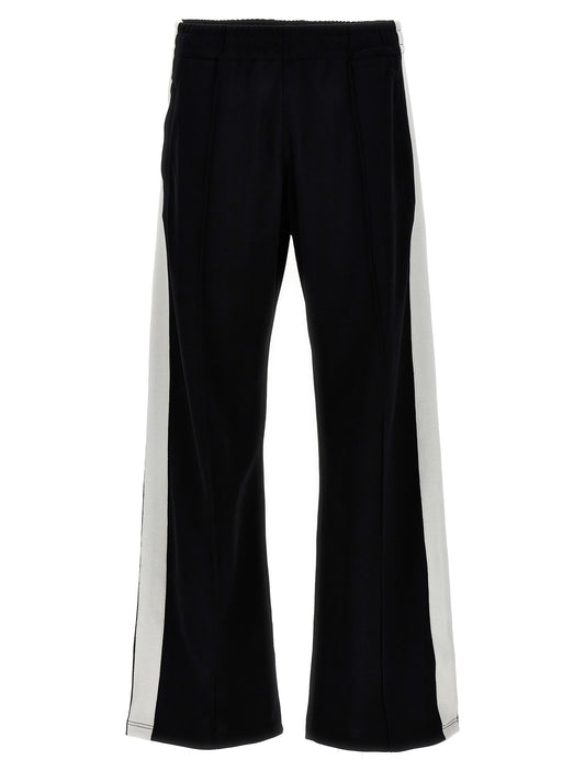 Joggers by Isabel Marant for men in cotton polyester bicolour, black & white presents a tailored silhouette, showcasing a tailored and long cut with a refined for a truly tailored aesthetic.
