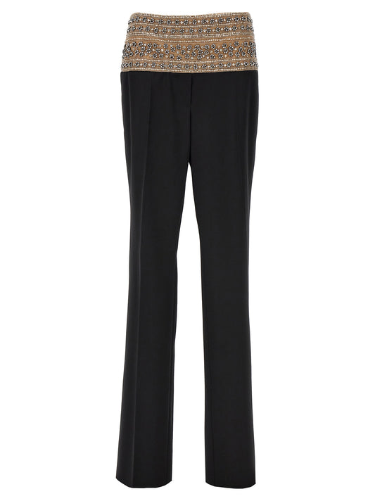 Trousers by Stella McCartney for women in wool mesh & crystal black presents a perennial silhouette, meticulously tailored with a cut, long finish, and an elegant .