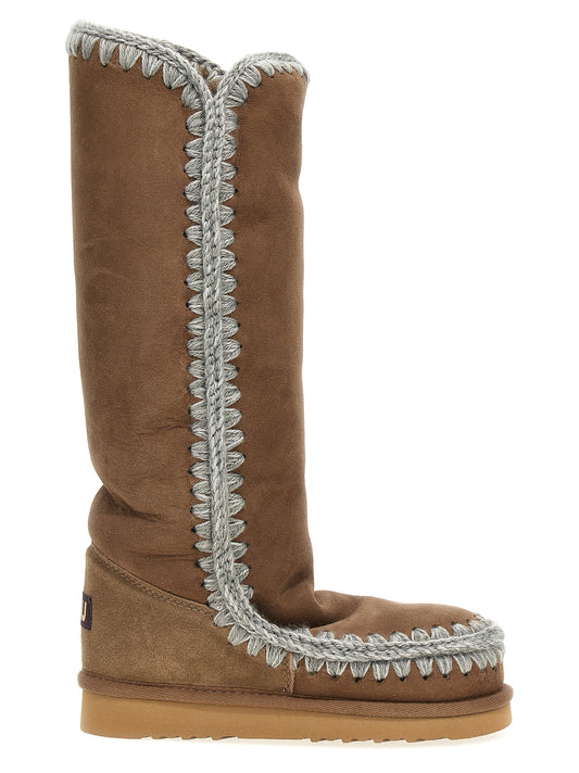 Ankle Over-The-Knee Boots by Mou for women in suede lamb leather & fur brown features an dynamic silhouette, showcasing the dynamic Women's Suede Lamb Leather & Fur Ankle Over-The-Knee Boots design with its distinctive and elegant .