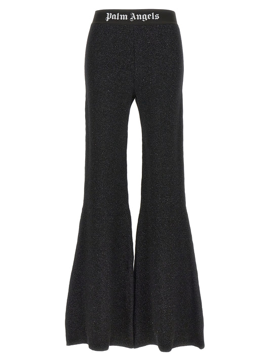 Trousers by Palm Angels for women in cashmere wool lurex & viscose black & jacquard presents a smart silhouette, meticulously detailed with a smart flared, a smart long, and a smart .