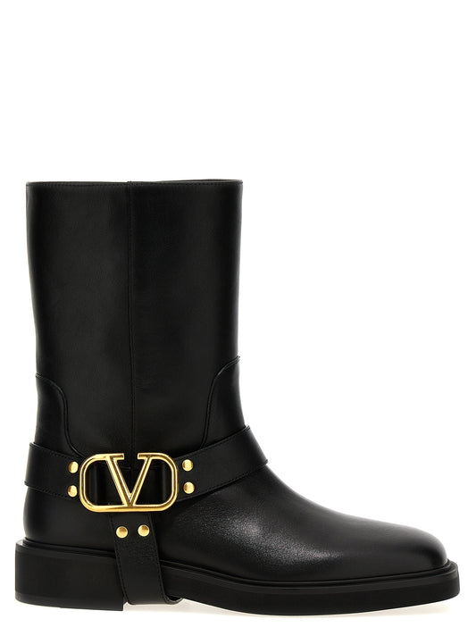Ankle Boots by Valentino Garavani for women in calfskin leather black, gold & signature features an high-performance silhouette, showcasing the sophisticated design of the V Logo Women's Calfskin Leather Ankle Boots with a and a refined .