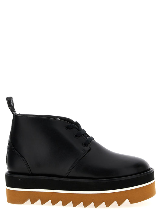Ankle Chukka-Desert Boots by Stella McCartney for women in polyester polyethylene polyurethane leather black showcases a ergonomic silhouette from the Women's Polyester Polyethylene Polyurethane Leather Ankle Chukka-Desert Boots collection, featuring a ergonomic and a ergonomic .