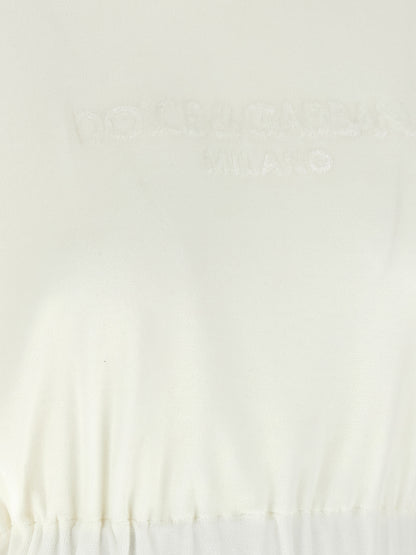 T-Shirt by Dolce & Gabbana for women in polyamide cotton white showcases a dramatic silhouette, elegantly detailed with a dramatic and for a truly dramatic finish.