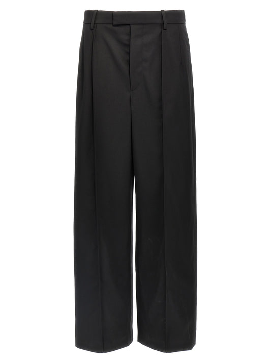 Trousers by Wardrobe.Nyc for women in wool black features an sartorial silhouette, showcasing a precise straight and long with a sartorial high rise for a refined look.