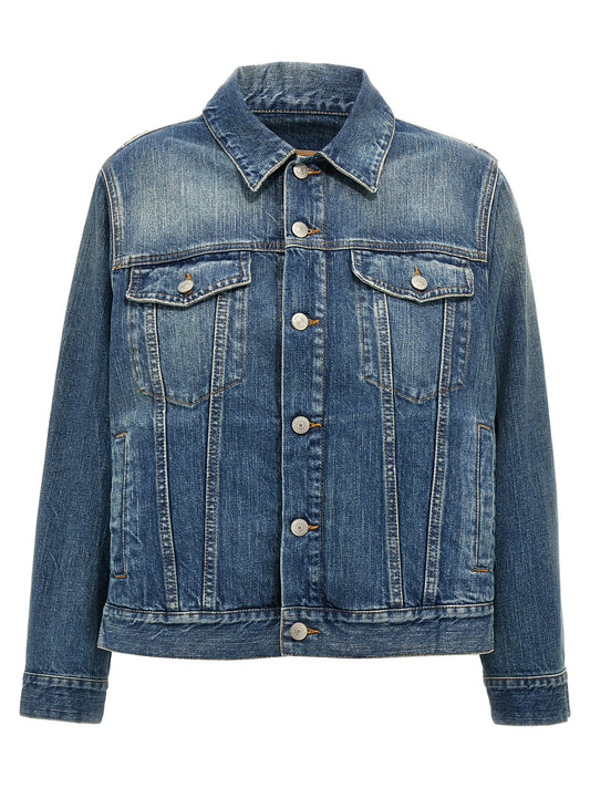 Trucker Jacket by MM6 Maison Margiela for women in denim cotton blue features an contemporary silhouette, showcasing a sophisticated and contemporary pockets for a truly refined look.