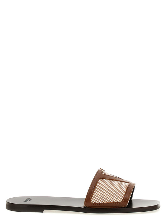 Sliders Sandals Flat Shoes by Valentino Garavani for women in cotton canvas & leather brown presents a impeccable silhouette as V Logo Women's Cotton Canvas & Leather Sliders Sandals Flat Shoes, artfully designed with a and a impeccable for a refined, upscale finish.