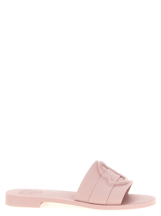 Sliders Flat Shoes by Moncler for women in thermoplastic polyurethane multicolor & pink presents a effortless chic silhouette, showcasing the Women's Thermoplastic Polyurethane Sliders Flat Shoes design with a effortless chic and for a sophisticated look.
