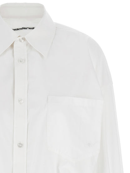 Dress by Alexander Wang for women in wool cotton multicolor features a dramatic silhouette, showcasing an elegant and that flows into a dramatic short mini.