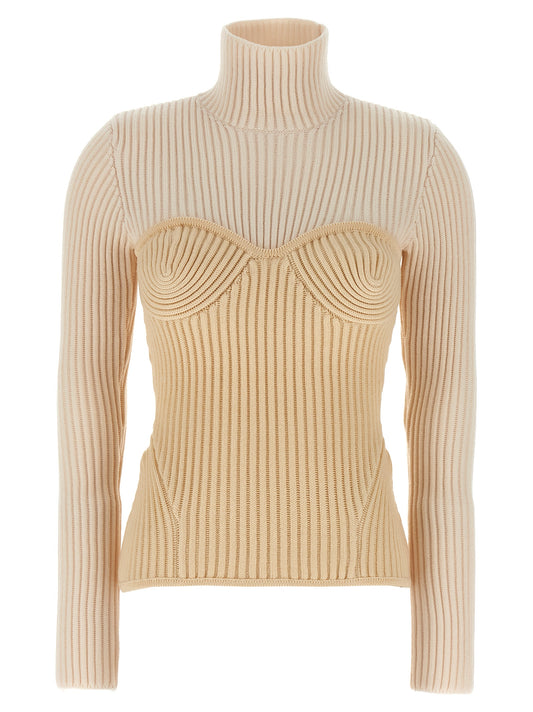 Top by Jean Paul Gaultier for women in merino wool beige showcases a chic silhouette, artfully detailed with a chic high-neck neckline and long-sleeve for a sophisticated, chic finish.