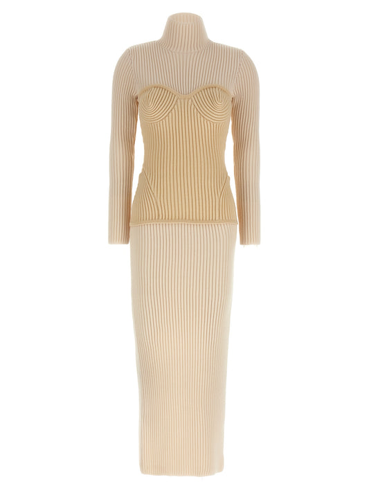Dress by Jean Paul Gaultier for women in merino wool beige features an eye catching silhouette with a sophisticated split high-neck neckline, elegant long-sleeve, and a refined long for a eye catching aesthetic.
