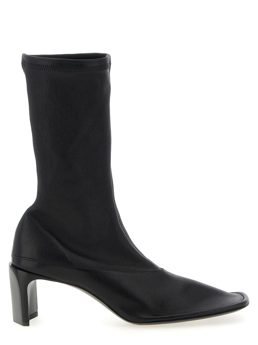 Ankle Boots by Jil Sander for women in nappa lamb leather black features an effortless chic silhouette from the Women's Nappa Lamb Leather Ankle Boots collection, showcasing a effortless chic and refined square toe style for an effortless chic look.