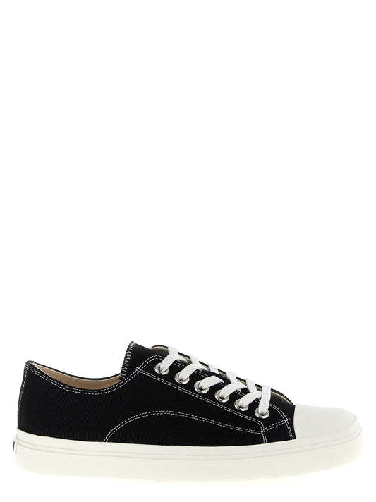 Sneakers by Moschino for men in cotton canvas bicolour, black & white presents a impeccable silhouette as Men's Fashion Cotton Canvas Sneakers, expertly defined by a impeccable fashion style for a impeccable, high-fashion look.