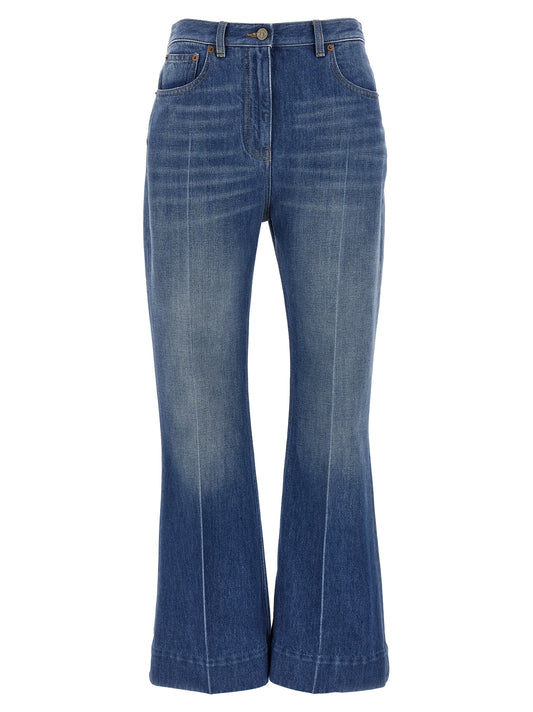 Jeans by Valentino Garavani for women in denim cotton light-blue features an sartorial flared and long with a cut for a sartorial finish.