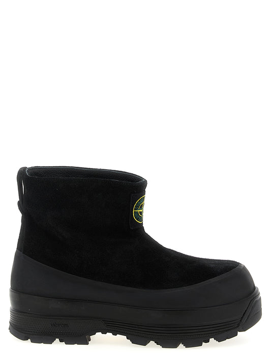 Ankle Boots by Stone Island for men in suede leather black features an effortless chic silhouette from the Men's Suede Leather Ankle Boots collection, showcasing a effortless chic and refined for an effortless chic look.