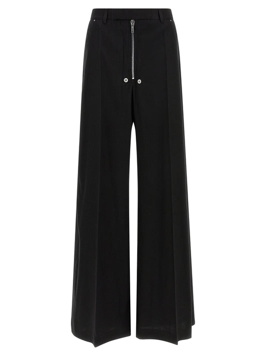 Pants by Rick Owens for women in wool cotton black showcases a unrivaled comfort silhouette, featuring a wide cut and long with a for a unrivaled comfort and refined aesthetic.