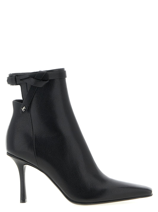 Stiletto Ankle Cut-Out Strap Boots by Jimmy Choo for women in plastic leather & silk black features an dynamic silhouette, showcasing the dynamic Women's Plastic Leather & Silk Stiletto Ankle Cut-Out Strap Boots design with its distinctive stiletto and elegant square toe style.