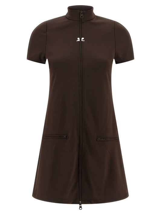 Dress by Courrèges for women in polyester brown & signature features an sultry silhouette defined by a high-neck neckline and short-sleeve, falling to an sultry short mini for a sultry look.
