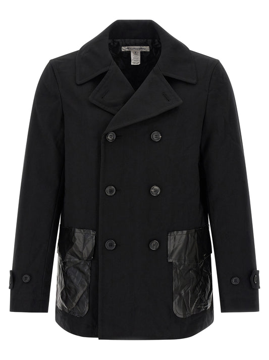 Overcoat by Comme Des Garçons for men in polyester black features a contemporary silhouette showcasing a contemporary and refined pockets & insulated for a sophisticated finish.