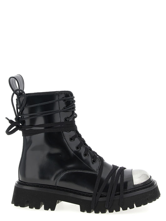 Lace-Up Combat Boots by Moschino for women in calfskin leather black features an effortless chic silhouette from the Women's Calfskin Leather Lace-Up Combat Boots collection, showcasing a effortless chic and refined for an effortless chic look.