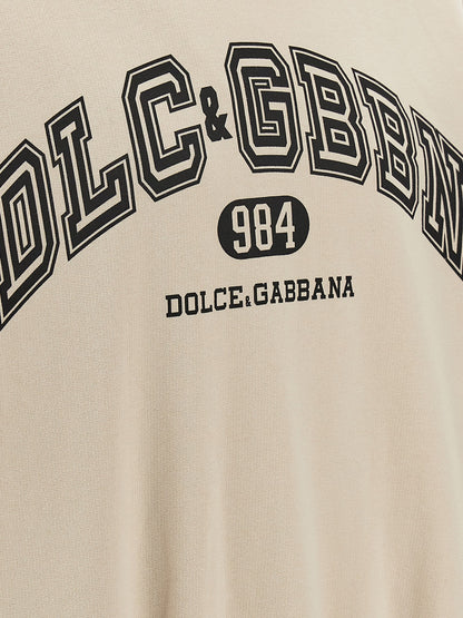 Sweatshirt Hoodie by Dolce & Gabbana for men in cotton beige & print features an luminous silhouette, showcasing a sophisticated and for a truly luminous look.