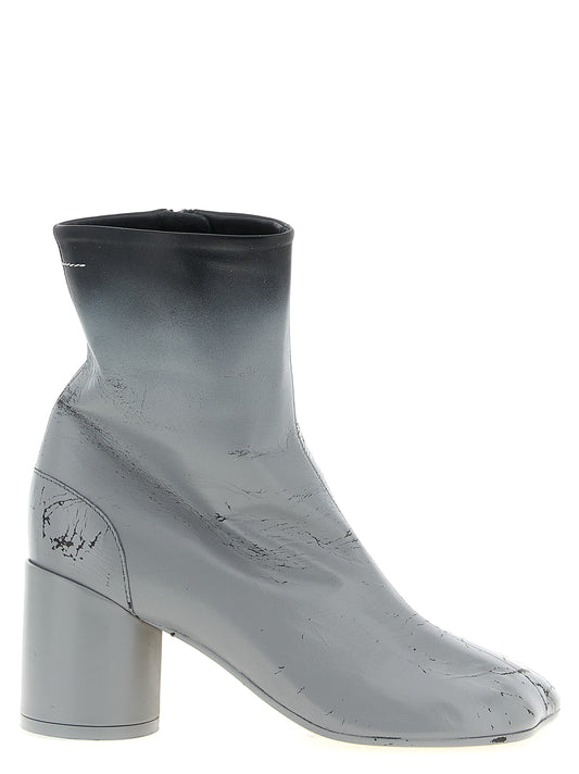 Ankle Boots by MM6 Maison Margiela for women in lambskin leather gray & white features an avant-garde Women's Lambskin Leather Ankle Boots silhouette, defined by a sophisticated and a avant-garde .