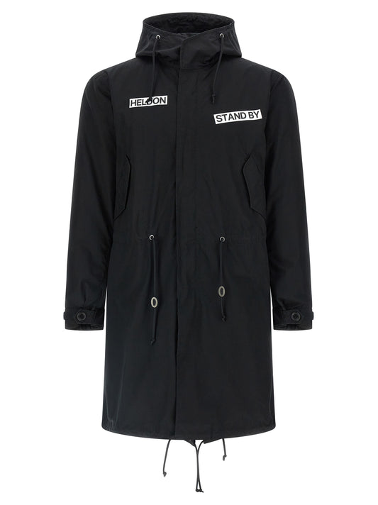 This Hooded Parka by Undercover for men in nylon cotton black presents a enveloping silhouette, meticulously detailed with pockets & hooded and a enveloping hooded high-neck neckline.