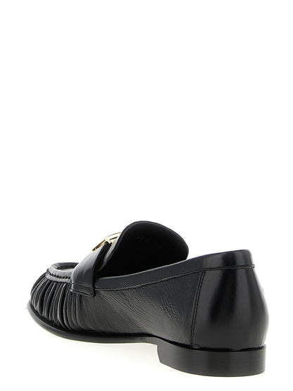 Flat Loafer Slip-On Shoes by Fendi for women in lamb leather black & signature showcases a resplendent Women's Lamb Leather Flat Loafer Slip-On Shoes aesthetic, defined by its resplendent and elegant flat.
