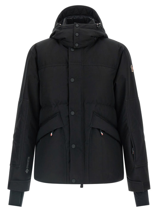 Hooded Windbreaker Jacket by Moncler Grenoble for men in polyester corduroy & goose-down black presents a resilient silhouette, artfully detailed with a sophisticated hooded high-neck neckline and functional hooded, insulated & windproof for a resilient finish.