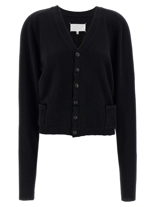 Cardigan by Maison Margiela for women in wool black & signature features an impeccable silhouette, showcasing a sophisticated v-neck neckline and long-sleeve detail for a truly impeccable finish.