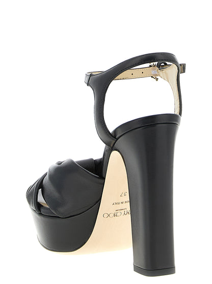 Platform Stiletto Ankle Strap Sandals by Jimmy Choo for women in leather & satin black showcases a sculptural silhouette as Women's Leather & Satin Platform Stiletto Ankle Strap Sandals, defined by a sculptural stiletto platform and sculptural for a sculptural look.