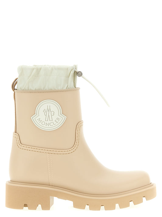Ankle Rain Boots by Moncler for women in nylon eva & pvc beige features an high-performance silhouette, showcasing the sophisticated design of the Women's Nylon EVA & PVC Ankle Rain Boots with a and a refined .
