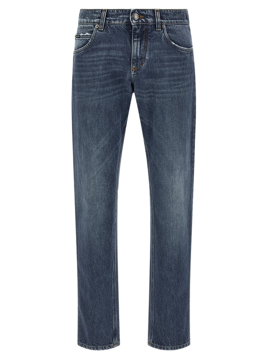 Jeans by Dolce & Gabbana for men in cotton denim blue presents a tailored silhouette, showcasing a tailored straight-leg and long cut with a refined for a truly tailored aesthetic.