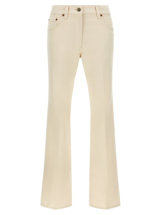 Jeans by Valentino Garavani for women in denim cotton beige presents a tailored silhouette, showcasing a tailored flared and long cut with a refined for a truly tailored aesthetic.