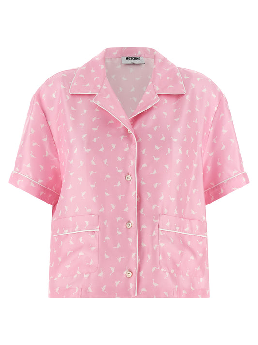 Blouse by Moschino for women in silk twill multicolor, pink & print showcases a sleek silhouette, elegantly detailed with a sleek and short-sleeve for a sleek finish.