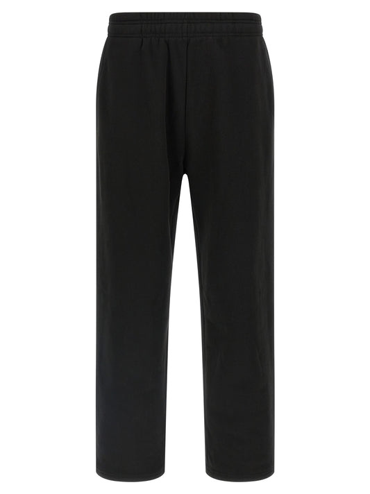 Joggers by Entire Studios for men in cotton black features an sartorial straight-leg & wide and long with a cut for a sartorial finish.