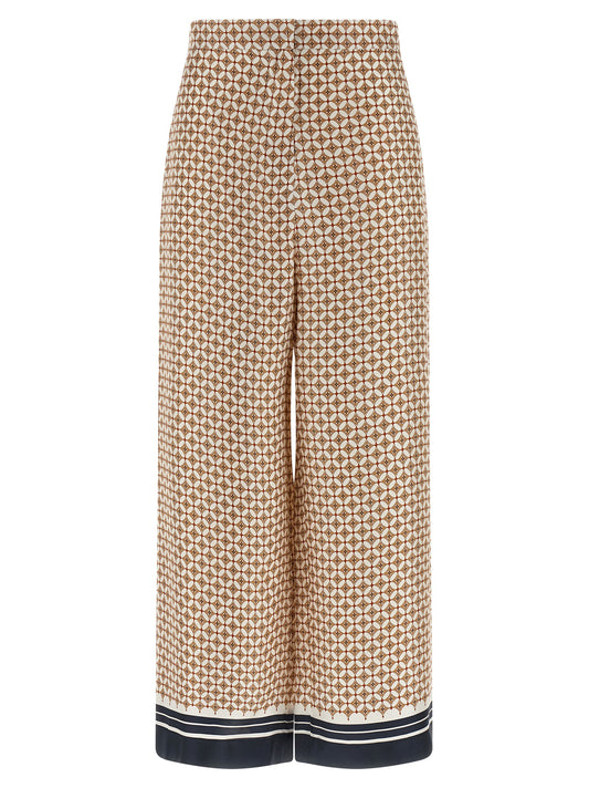 Trousers by Max Mara for women in silk twill blue & print presents a perennial silhouette, meticulously tailored with a straight-leg & wide cut, long finish, and an elegant high rise.