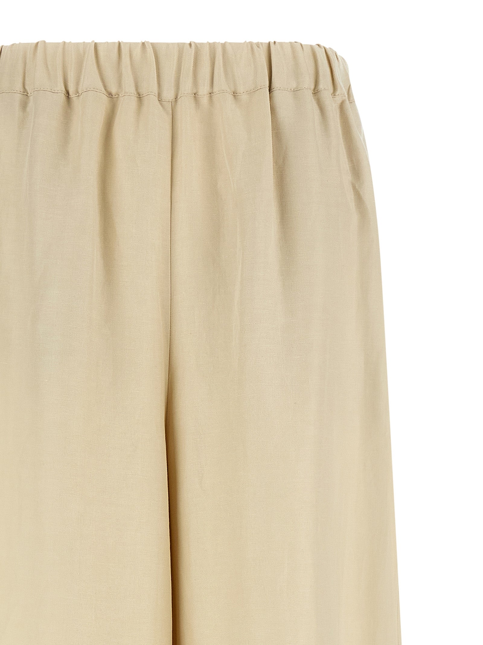 Trousers by Max Mara for women in silk linen twill beige features an sartorial silhouette, showcasing a precise straight-leg & wide and long with a sartorial for a refined look.