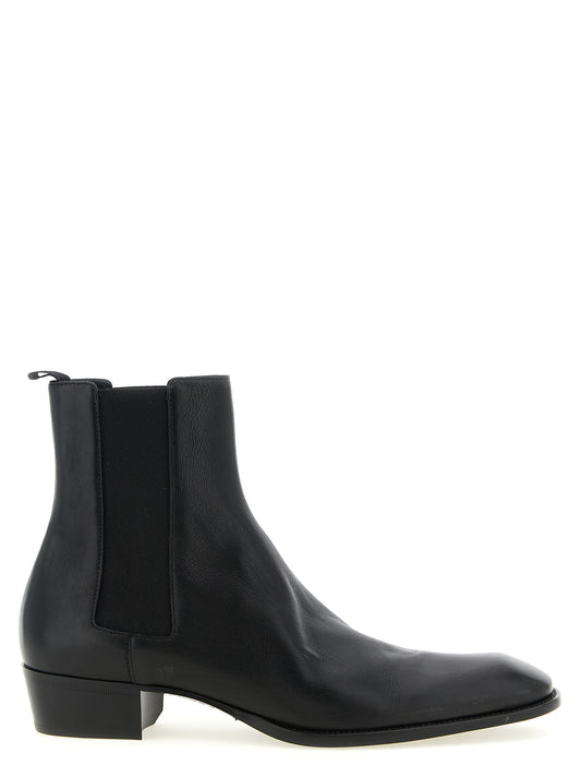 Ankle Chelsea Boots by Saint Laurent for men in bos taurus calfskin leather black showcases a impeccable silhouette as Men's Bos Taurus Calfskin Leather Ankle Chelsea Boots, artfully defined by a impeccable and a impeccable square toe style.