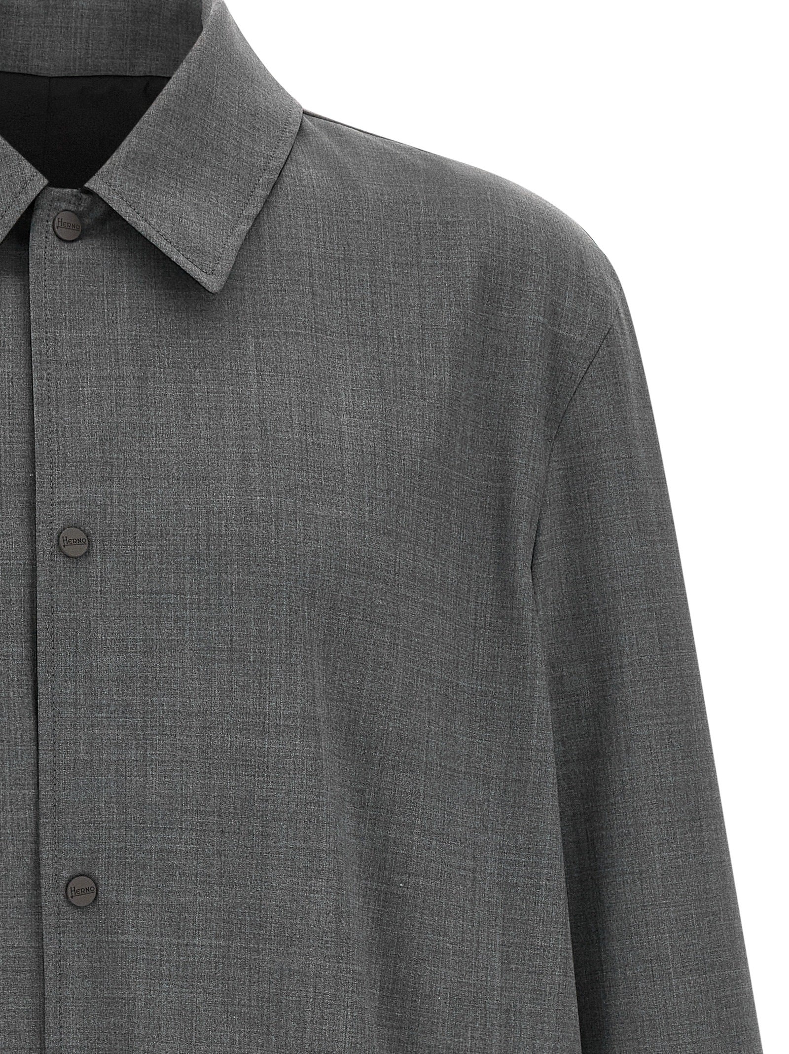 Overcoat by Herno for men in polyester wool multicolor features a cosy chic silhouette, artfully detailed with a sophisticated shirt-collar neckline and premium water-resistant, lightweight & pockets for a cosy chic finish.
