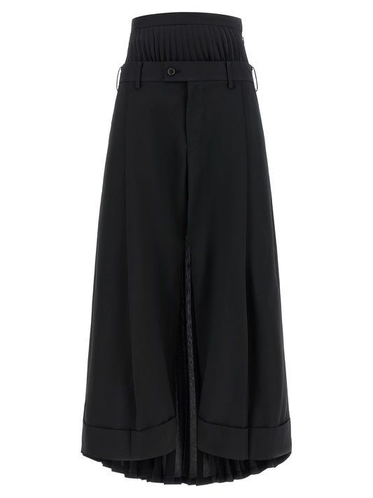 Trousers by Junya Watanabe for women in polyester polyurethane wool black presents a smart silhouette, meticulously detailed with a smart straight, a smart long, and a smart .