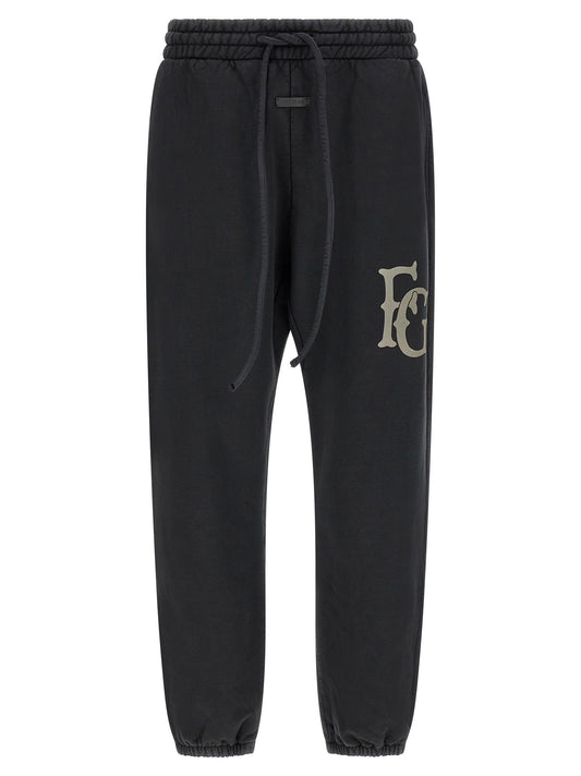 Joggers by Fear Of God for men in leather & cotton black features an refined tailoring silhouette, showcasing a premium straight-leg with a and long cut for a refined tailoring look.