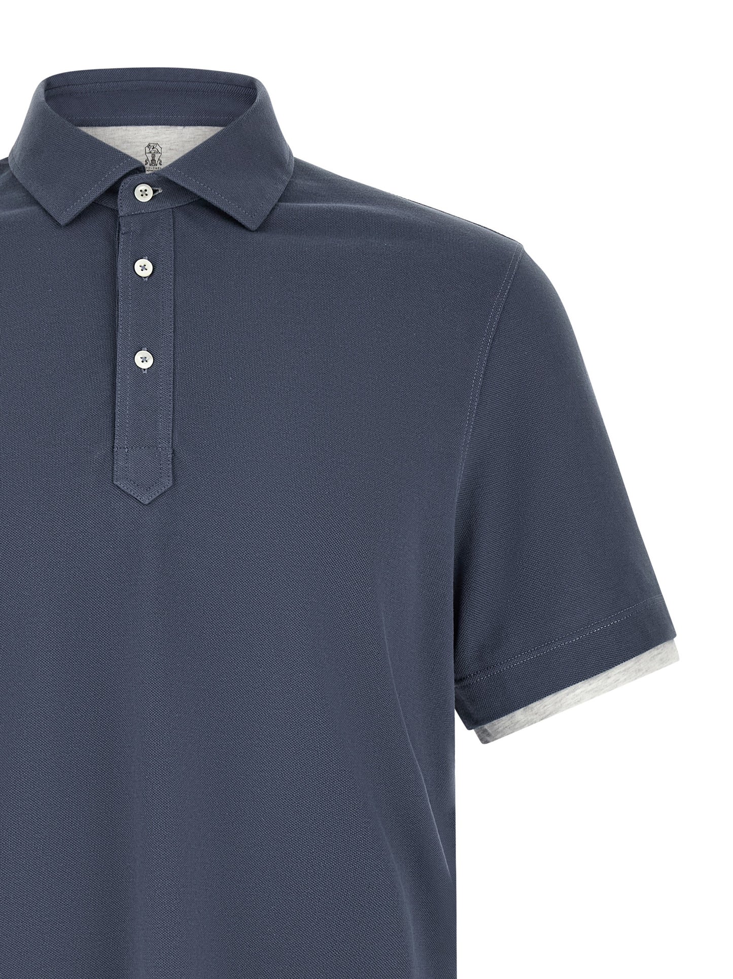 Polo Shirt by Brunello Cucinelli for men in cotton blue showcases a sharp silhouette, detailed with a refined and sharp for a sophisticated finish.