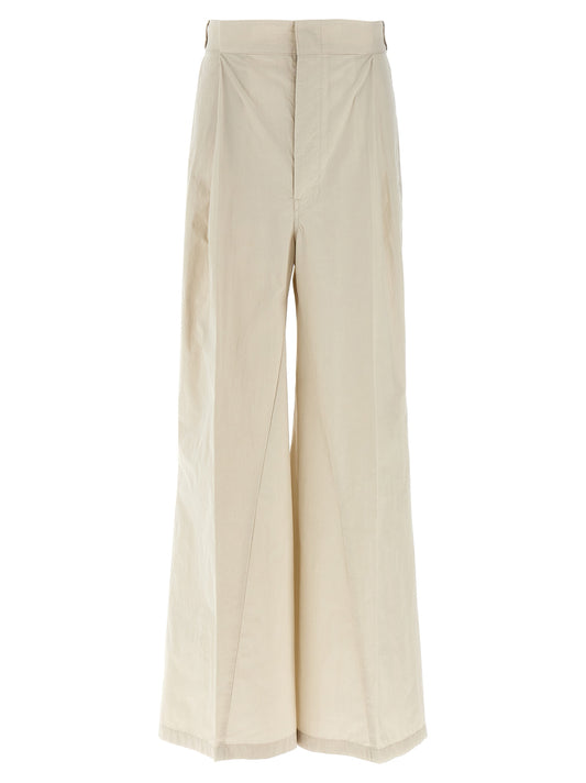Casual Pants by Maison Margiela for women in polyamide cotton beige presents a refined pantology silhouette, artfully defined by a refined pantology wide, long, and a sophisticated .