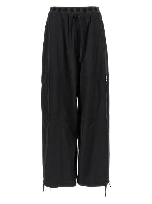 Cargo Pants by Kenzo for women in cotton polyester black features an urban chic with a and long, creating a urban chic aesthetic for "Moon Behind the Hill".