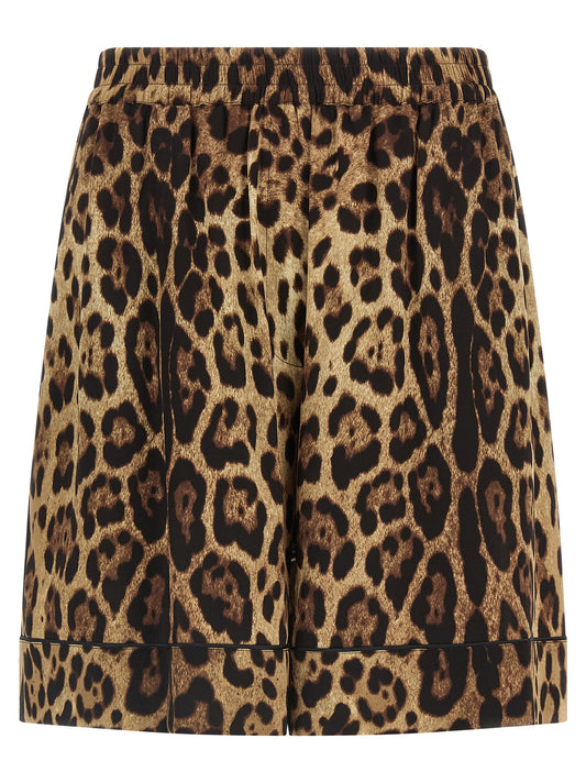 Bermuda Shorts by Dolce & Gabbana for women in silk black, brown, leopard-print & print presents a contemporary silhouette, showcasing a contemporary with a refined short and elegant .