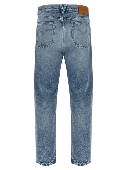 Jeans by Versace for men in denim cotton blue features an sophisticated and straight-leg with a precise long, creating a sophisticated and sophisticated silhouette.