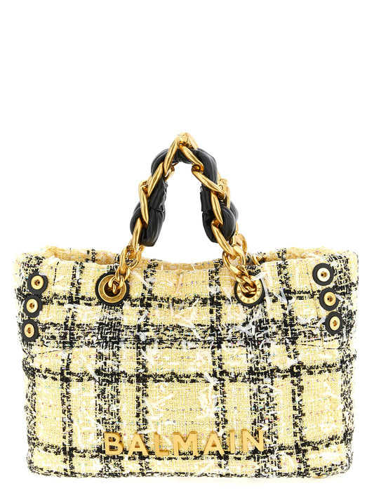 Small Shopper Tote Bag by Balmain for women in poly suede leather & cotton multicolor features a jet-set sophisticated Cabas Poly Suede Leather & Cotton Small Shopper Tote Bag design with a secure magnetic, ample , and versatile handle for a jet-set sophisticated finish.