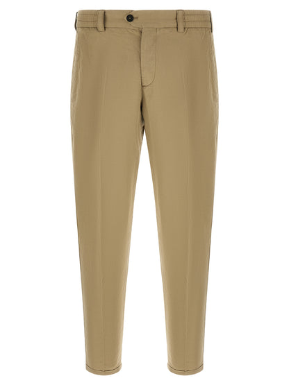 Trousers by PT Torino for men in linen & cotton beige presents a perennial silhouette, meticulously tailored with a cut, long finish, and an elegant low rise.