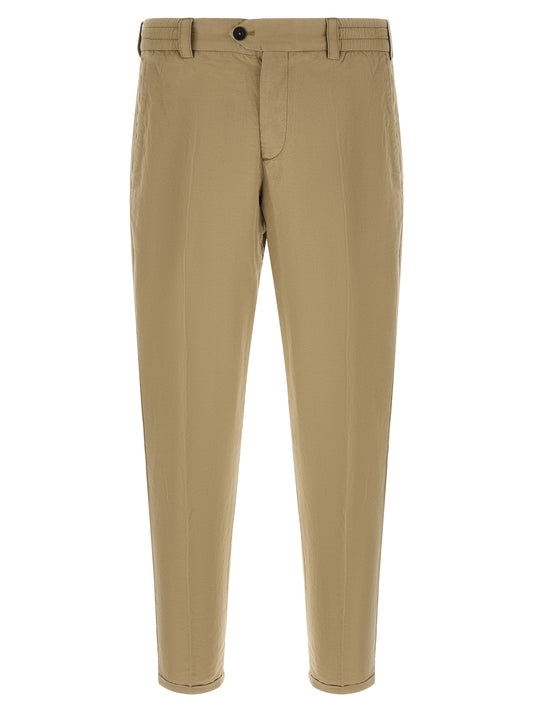 Trousers by PT Torino for men in linen & cotton beige presents a perennial silhouette, meticulously tailored with a cut, long finish, and an elegant low rise.